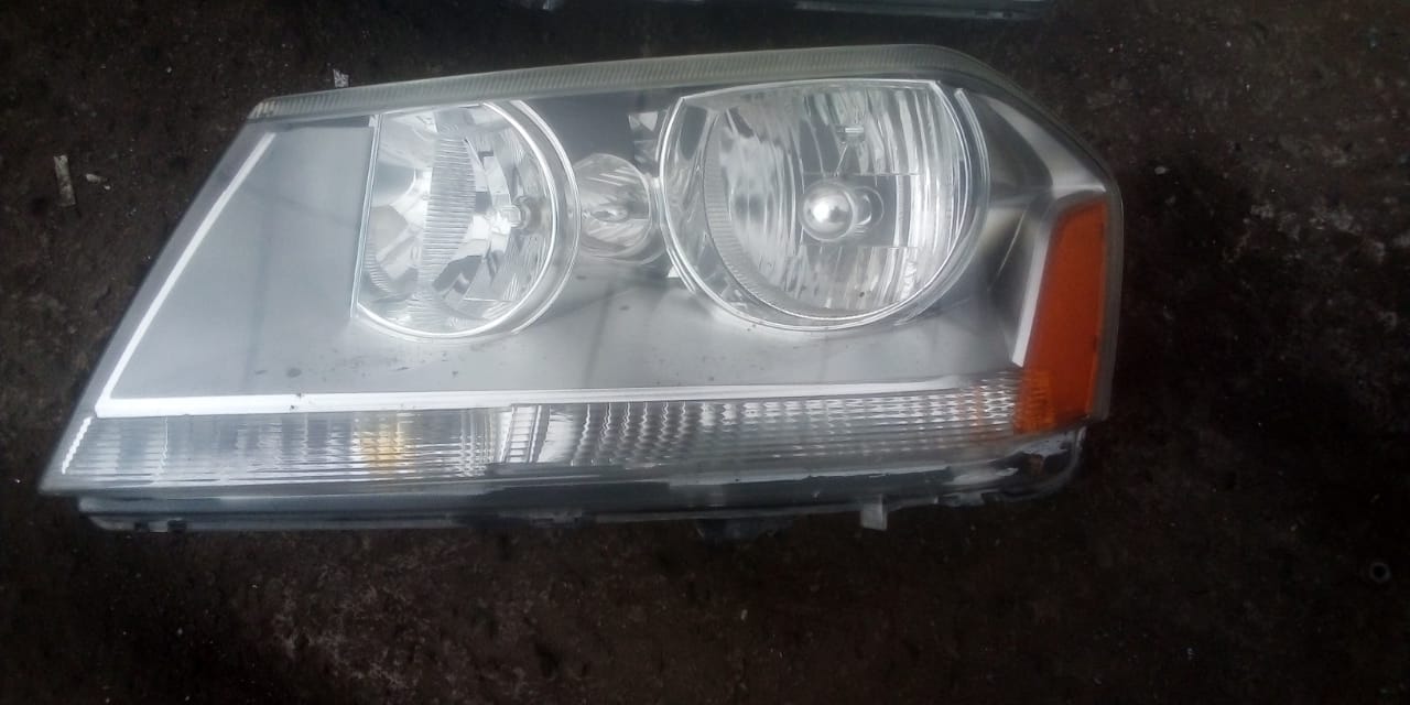 FAROS DELANTEROS DODGE AVENGER 2008 AL 2014